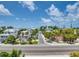 Aerial view of beachside homes and street at 9403 Gulf Dr, Anna Maria, FL 34216