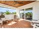 Private balcony with comfy seating and ocean views at 9403 Gulf Dr, Anna Maria, FL 34216