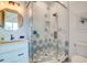 Bathroom with a walk-in shower and hexagonal tile at 9403 Gulf Dr, Anna Maria, FL 34216