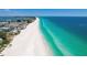 Aerial view of beach and oceanfront homes at 9403 Gulf Dr, Anna Maria, FL 34216