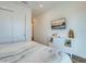 Bedroom with a king-size bed and built-in dresser at 9403 Gulf Dr, Anna Maria, FL 34216
