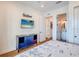 Bedroom with TV, dresser, and ensuite bathroom at 9403 Gulf Dr, Anna Maria, FL 34216
