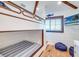 Bunk bed bedroom with built in lower bed and ocean theme at 9403 Gulf Dr, Anna Maria, FL 34216