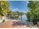 Private dock with wooden deck offering waterfront access at 9403 Gulf Dr, Anna Maria, FL 34216