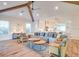 Bright and airy living room with vaulted ceilings and hardwood floors at 9403 Gulf Dr, Anna Maria, FL 34216