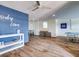 Playroom with foosball, ping pong, and blue accent wall at 9403 Gulf Dr, Anna Maria, FL 34216