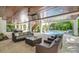 Inviting pool area with lounge chairs and patio furniture at 9403 Gulf Dr, Anna Maria, FL 34216