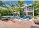 Luxury home with a large, unique pool and putting green at 9403 Gulf Dr, Anna Maria, FL 34216