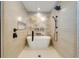 Spa-like bathroom with freestanding tub and walk-in shower at 9407 Gulf Dr, Anna Maria, FL 34216