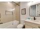 Clean bathroom with a tub, shower, and modern vanity at 9407 Gulf Dr, Anna Maria, FL 34216