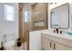 Clean bathroom with walk-in shower and single vanity at 9407 Gulf Dr, Anna Maria, FL 34216
