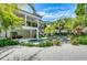 Stunning pool and spa area with ample lounge chairs at 9407 Gulf Dr, Anna Maria, FL 34216