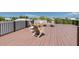 Relaxing rooftop deck with a city view and comfortable seating at 9407 Gulf Dr, Anna Maria, FL 34216