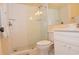 Clean bathroom with a walk-in shower and updated vanity at 1709 Pelican Cove Rd # Gl445, Sarasota, FL 34231