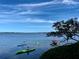 Kayakers enjoy a calm day on the water at 1709 Pelican Cove Rd # Gl445, Sarasota, FL 34231
