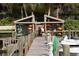 Community kayak storage with a dock and waterfront access at 1709 Pelican Cove Rd # Gl445, Sarasota, FL 34231