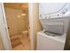 Convenient laundry area with stackable washer and dryer at 1709 Pelican Cove Rd # Gl445, Sarasota, FL 34231