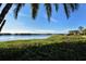 Scenic waterfront view with lush vegetation at 1709 Pelican Cove Rd # Gl445, Sarasota, FL 34231