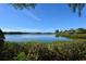 Expansive view of calm water and lush greenery at 1709 Pelican Cove Rd # Gl445, Sarasota, FL 34231