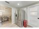 Kitchen featuring a stainless steel refrigerator and a partial view of the dining room through an open doorway at 1777 Pomelo Dr, Venice, FL 34293