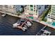 Aerial view of waterfront property with private boat docks at 258 Golden Gate Pt # 801, Sarasota, FL 34236