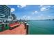 Relaxing waterfront bench on private boat dock at 258 Golden Gate Pt # 801, Sarasota, FL 34236