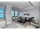 Spacious living room with water views and stylish furnishings at 258 Golden Gate Pt # 801, Sarasota, FL 34236