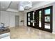 Elegant lobby with modern double doors and stylish decor at 258 Golden Gate Pt # 801, Sarasota, FL 34236