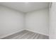 Spacious bedroom with wood-look floors and double door closet at 730 40Th St, Sarasota, FL 34234