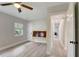 Bedroom with ceiling fan and access to hallway at 730 40Th St, Sarasota, FL 34234