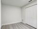 Simple bedroom with double doors and wood-look floors at 730 40Th St, Sarasota, FL 34234