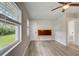 Bright bedroom with window, wood-look flooring, and a view of the backyard at 730 40Th St, Sarasota, FL 34234