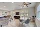 Bright dining area with round table and gray chairs near living room at 730 40Th St, Sarasota, FL 34234