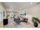Open concept living room with a dining area and large windows at 730 40Th St, Sarasota, FL 34234