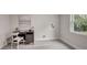 Bright home office features a desk and chair near a window at 730 40Th St, Sarasota, FL 34234
