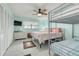 Bedroom with a king-size bed and a bunk bed, perfect for families at 8701 Midnight Pass Rd # 106A, Sarasota, FL 34242