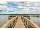 Nice community dock offering scenic waterfront views at 8701 Midnight Pass Rd # 106A, Sarasota, FL 34242