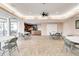 Community room with tables, chairs, and a kitchenette at 8701 Midnight Pass Rd # 106A, Sarasota, FL 34242