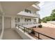 Interior hallway with access to condo unit at 8701 Midnight Pass Rd # 106A, Sarasota, FL 34242