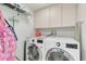 Convenient laundry room with washer and dryer at 8701 Midnight Pass Rd # 106A, Sarasota, FL 34242