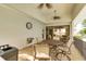 Outdoor patio furniture with ceiling fans and a view at 8701 Midnight Pass Rd # 106A, Sarasota, FL 34242