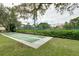 Play a game of shuffleboard in the shade at 8701 Midnight Pass Rd # 106A, Sarasota, FL 34242