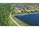 Aerial view of home with lake access and conservation views at 17208 Corinna Pl, Lakewood Ranch, FL 34202