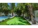 Enjoy your own private putting green in the backyard at 212 Spring Ave, Anna Maria, FL 34216