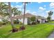 Cute single-story home with carport and lush landscaping at 2729 Riverbluff Ct # V93, Sarasota, FL 34231