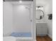 Basement bathroom with white subway tile shower and gray vanity at 3919 116Th Street W Ct, Bradenton, FL 34210