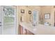 Clean bathroom with a large vanity and walk-in shower at 7115 Treymore Ct, Sarasota, FL 34243