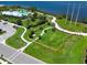 Aerial view of community amenities and waterfront at 1010 Tidewater Shores Loop # 103, Bradenton, FL 34208