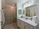 Bathroom boasts a large vanity and walk-in shower at 1010 Tidewater Shores Loop # 103, Bradenton, FL 34208