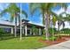 Community center with palm trees and landscaping at 1010 Tidewater Shores Loop # 103, Bradenton, FL 34208